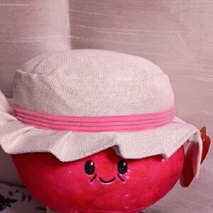 Adorable Pink and White Stuffed Animal with Hat